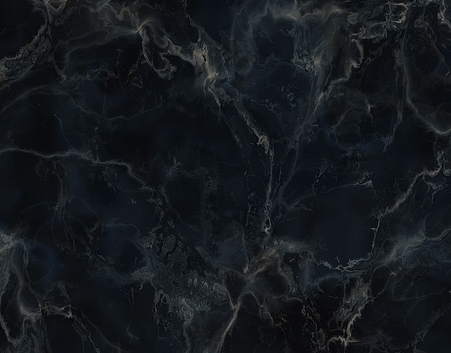 Abstract dark marble texture with glossy veins.